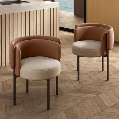 A contemporary accent chair featuring a rounded, enveloping backrest and seat, upholstered in contrasting dual tones. The chair is supported by four slender, straight black metal legs. — 3D model