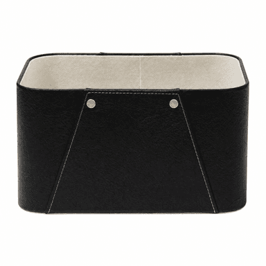 A rectangular storage basket featuring a textured black faux leather exterior and a contrasting light-colored fabric interior lining. The basket is detailed with light-colored saddle stitching along its edges and seams, and accented with four brass-toned studs, two on each wider side. Its structure is rigid, suggesting a reinforced frame underneath the covering materials. The top edge is neatly finished with a rounded trim. — 3D model