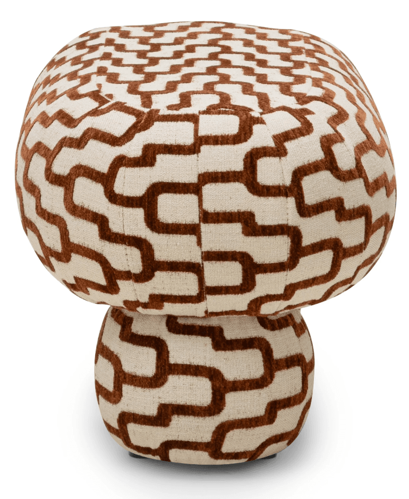 A mushroom-shaped upholstered ottoman featuring a repeating geometric pattern in brown against an off-white background. The ottoman consists of a wider, rounded top resembling a mushroom cap, and a narrower, cylindrical base resembling a stem, both fully upholstered in the same patterned fabric. — 3D model