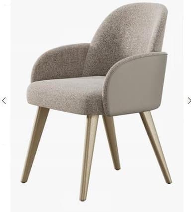 An upholstered armchair featuring a curved backrest and integrated armrests. The chair is covered in a textured grey fabric on the inner surfaces and outer backrest, with smooth taupe faux leather panels on the exterior sides of the arms and lower back. It stands on four tapered, splayed legs with a metallic finish. — 3D model