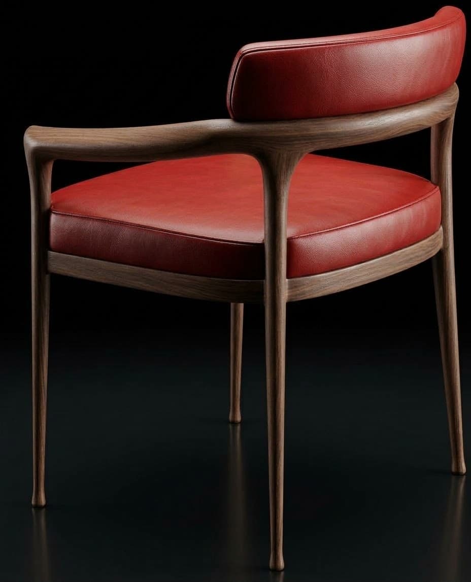 A modern armchair with a gracefully curved wooden frame and red upholstered seat and back, resting on slender tapered legs. — 3D model