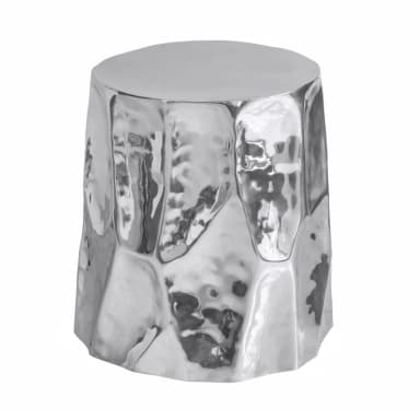 A highly reflective, silver-colored side table with a hammered, irregular geometric pattern on its base and a smooth, flat top. The overall form is cylindrical with a slightly tapered base. — 3D model