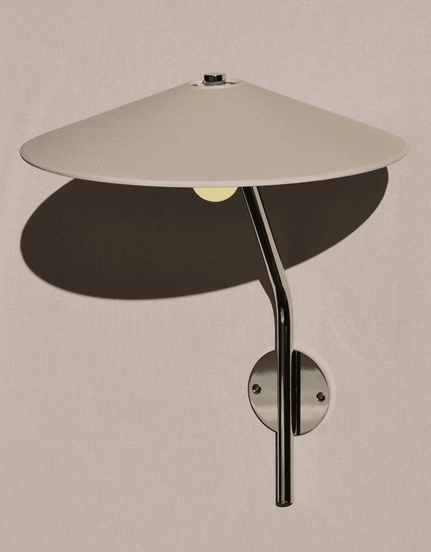 A contemporary wall sconce featuring a wide, conical fabric shade, a curved polished metal arm, and a circular wall-mounted plate, designed for directional or ambient lighting. — 3D model