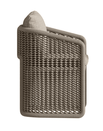 A contemporary chair featuring a thick, rounded frame entirely wrapped or constructed from a light-colored, textured synthetic rope or cord material. The chair includes a removable padded seat cushion and a matching back pillow, both upholstered in a complementary light beige fabric with a subtle woven texture. The frame forms continuous armrests and a backrest, with broad, integrated legs creating a sturdy and cohesive U-shaped form. The lower parts of the frame feature an open-weave pattern. — 3D model