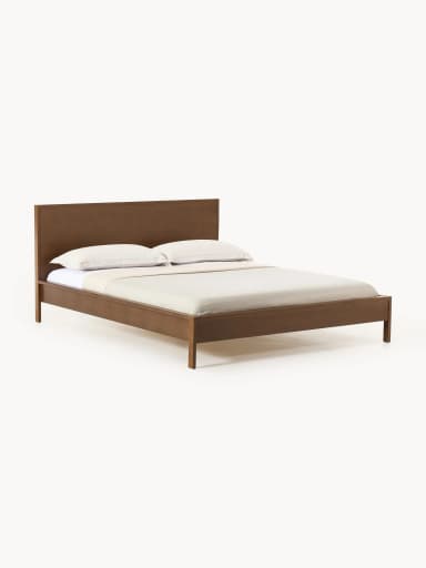 A modern platform bed featuring a clean, minimalist design crafted from dark-stained wood. It includes a solid, rectangular panel headboard and a low-profile frame with integrated legs, designed to support a mattress without the need for a box spring. The bed frame exhibits a smooth, finished surface. — 3D model