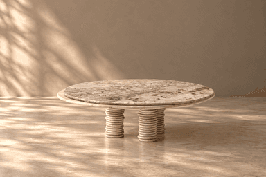 A compact, two-tiered accent table featuring circular tops and stout, stacked-ring legs, all crafted from a light-colored, veined marble. — 3D model