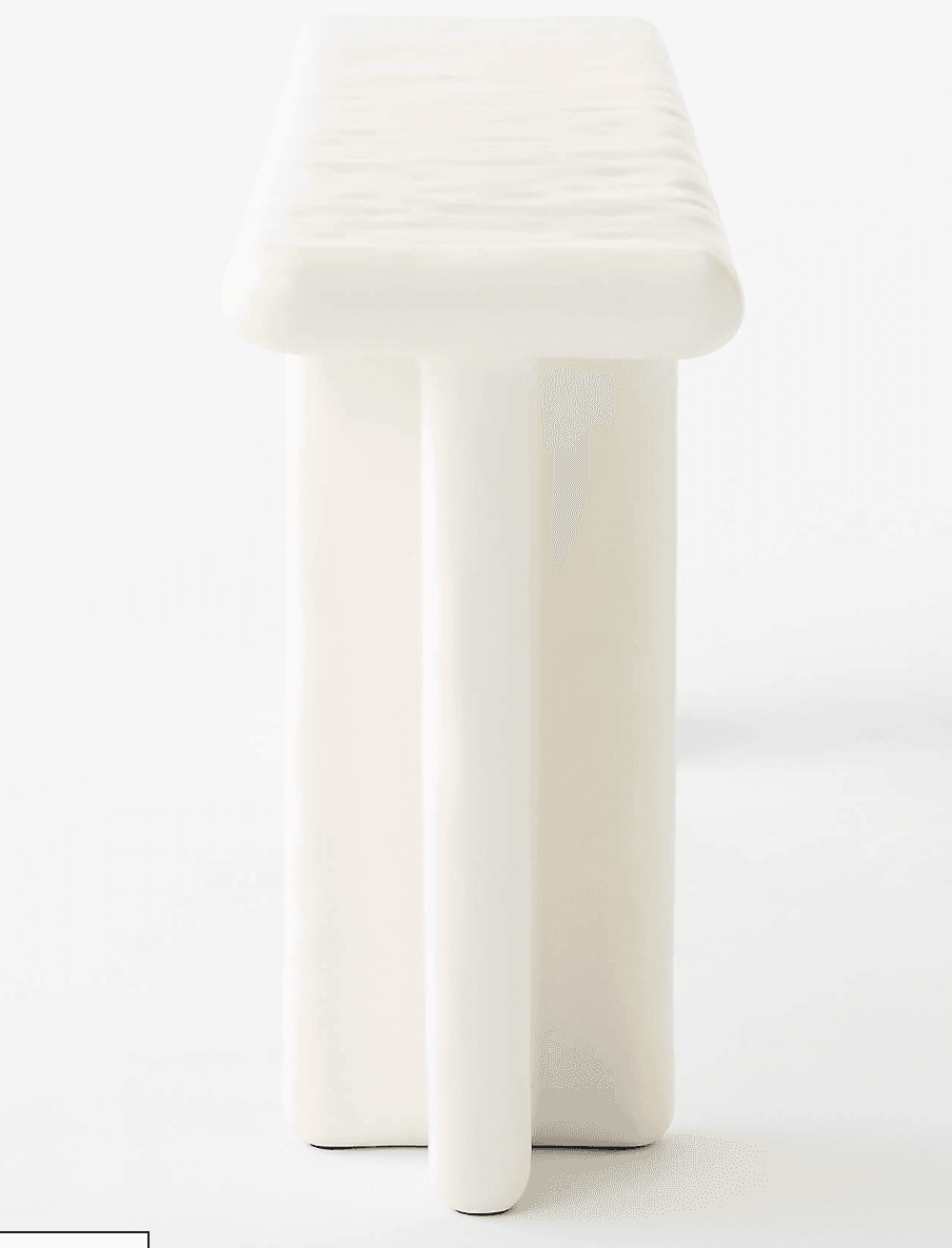 A minimalist bench with a rectangular seat and two vertical supports that appear to be fused or molded together in a single piece. The edges of the seat are rounded. The structure has a clean, modern aesthetic. — 3D model