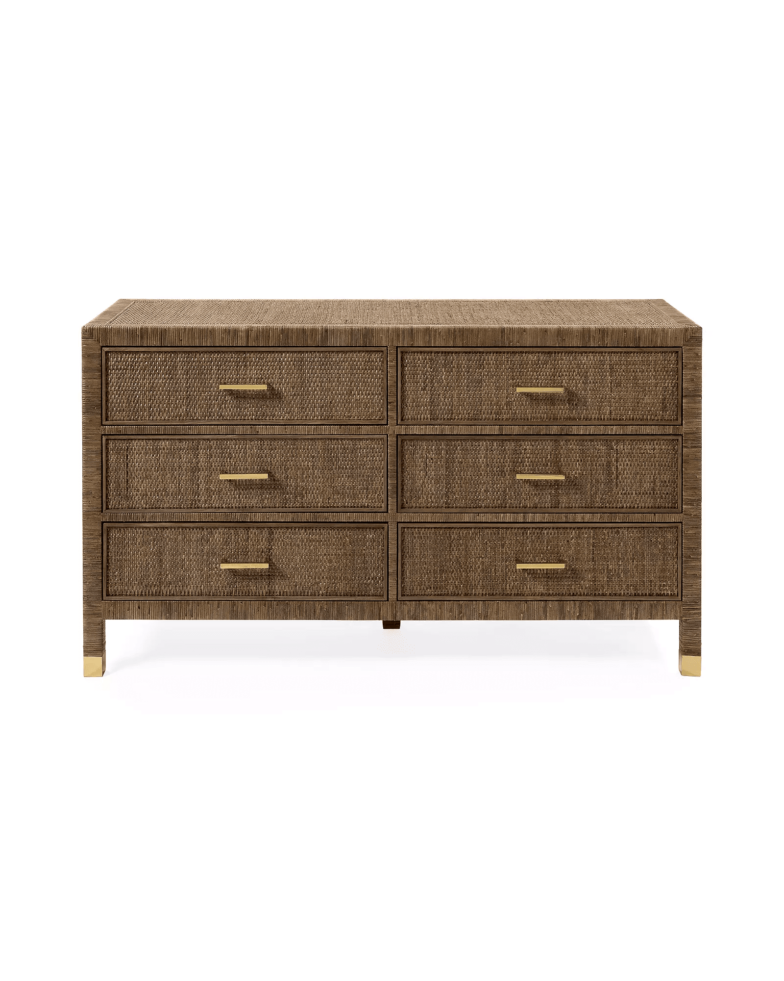 A six-drawer dresser with a woven rattan exterior and brass drawer pulls. The dresser has a rectangular top and rests on four legs, each with a brass-colored cap. — 3D model