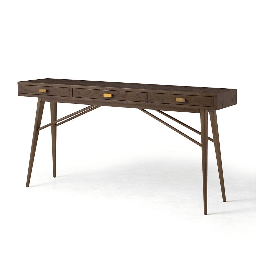 A long, narrow console table featuring a dark wood finish and three integrated drawers, supported by tapered, splayed legs connected by brass-toned stretcher bars. — 3D model