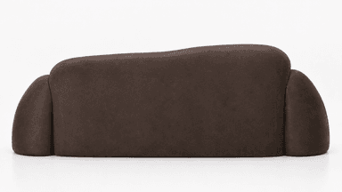 A contemporary sofa with rounded, plush arms and backrest. The upholstery appears to be a textured faux leather or similar material. The base is a solid, dark-colored plinth. The design features organic, curvilinear forms. — 3D model