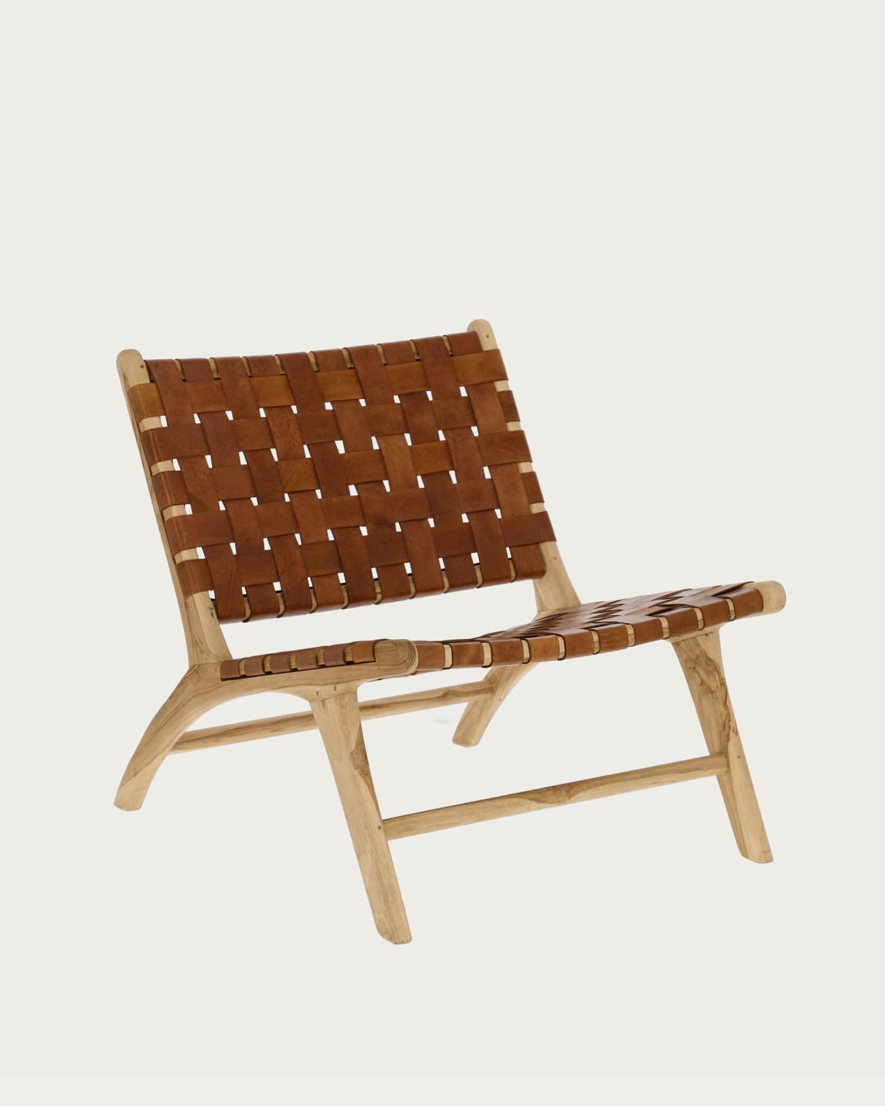 A low-profile lounge chair featuring a sturdy natural teak wood frame and a seat and backrest made from intricately woven brown leather straps. The design is minimalist and uses natural materials. — 3D model