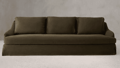 A three-seater sofa upholstered in a textured olive green fabric, featuring a relaxed slipcover design with a skirted base and gently rolled arms. It includes three individual seat cushions and three loose back cushions for comfort. — 3D model