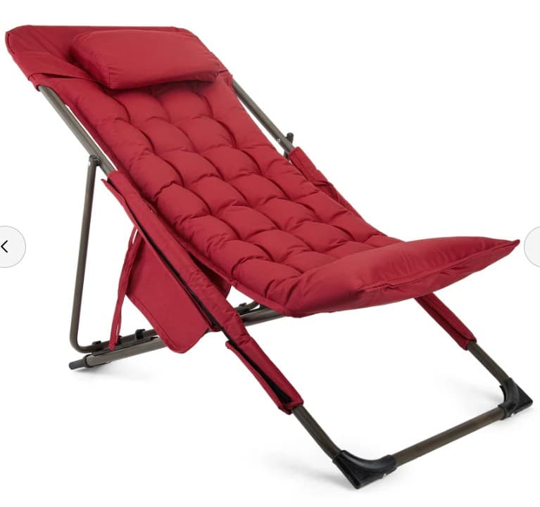 A red lounge chair with a metal frame and a padded cushion. The chair has an adjustable backrest and a headrest. It appears to be a portable or foldable design, suitable for outdoor use. — 3D model