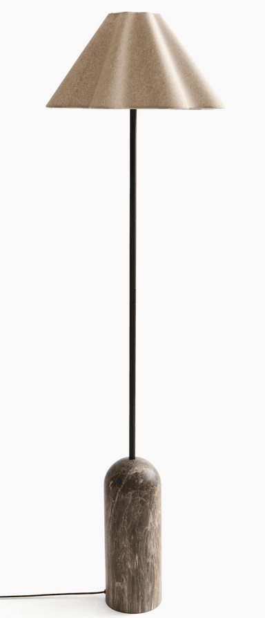 A contemporary floor lamp featuring a robust, cylindrical marble base, a slender black metal stem, and a distinctive conical shade made from a textured, beige textile. The lamp exhibits a minimalist yet elegant aesthetic, suitable for modern interiors. The power cord exits neatly from the base. — 3D model