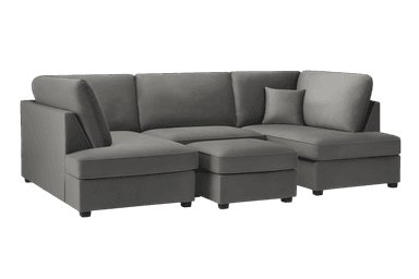 A modular three-seater sofa with a low profile and deep seating. It features thick, plush seat cushions and back cushions. The sofa is upholstered in a textured, matte gray fabric. Accent pillows are placed on either end, angled against the back cushions. The sofa rests on short, dark, block-style legs. — 3D model