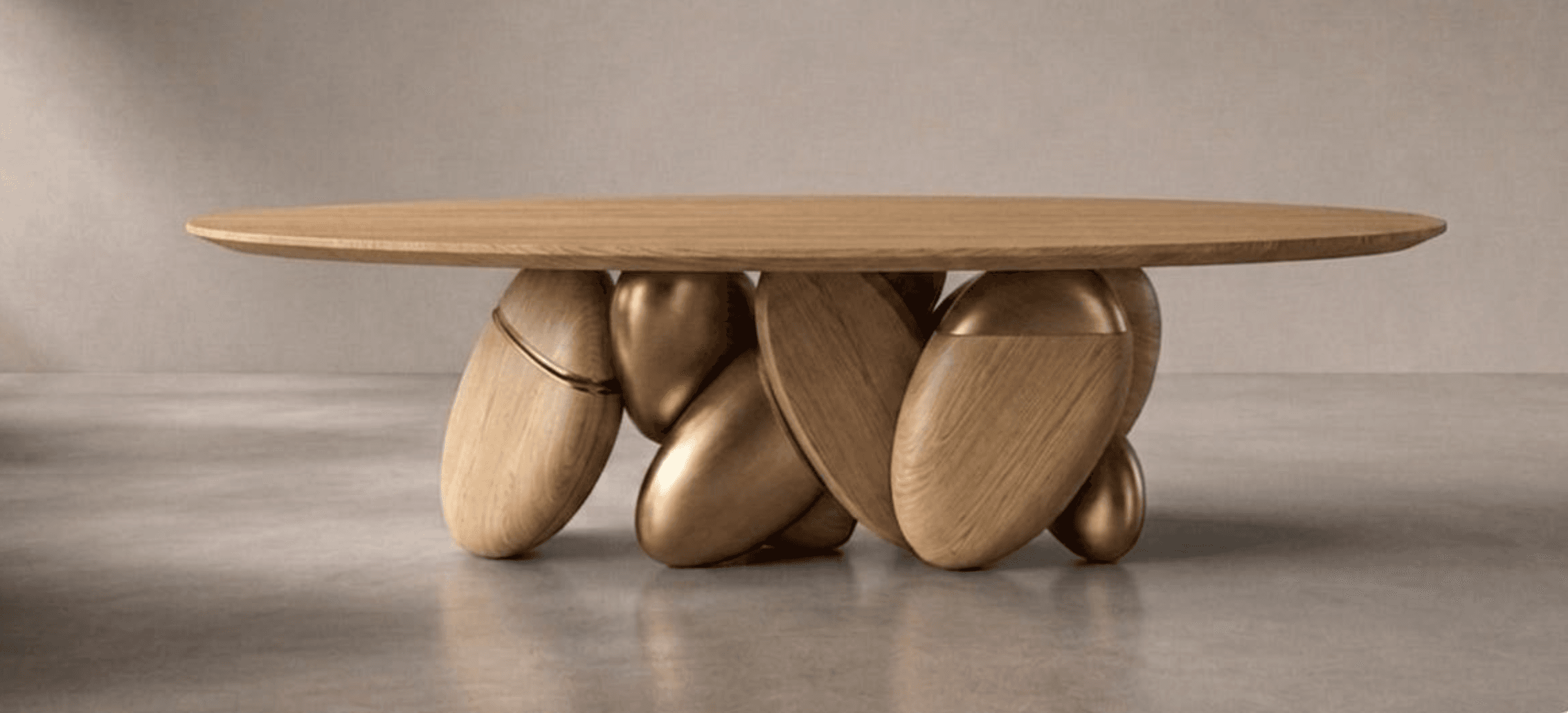 An oval-shaped coffee table featuring a light-toned wooden top and a distinctive sculptural base. The base consists of intertwined elements, some crafted from the same light wood as the top, and others from a contrasting bronze-finished metal, creating an organic and modern aesthetic. — 3D model
