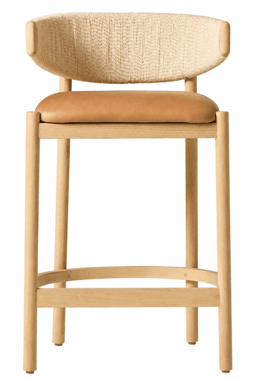 A contemporary counter-height bar stool featuring a light natural wood frame, a tan leather upholstered seat, and a curved backrest with a woven natural fiber infill. It includes a circular footrest for support. — 3D model