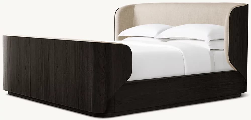 A modern platform bed featuring a dark wood frame with distinct graining and gently curved corners. The headboard is integrated, upholstered in a light, neutral fabric, and extends along the sides, enveloping the sleeping area. The bed has a low-profile base, suggesting a platform design that does not require a box spring. White bedding is present, indicating its function. — 3D model