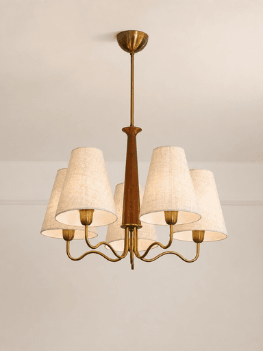 A multi-arm chandelier featuring a brass frame, a central wooden column, and five tapered fabric shades. The fixture is suspended by a brass rod and canopy. — 3D model