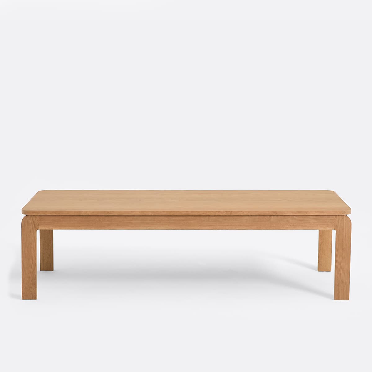 A rectangular coffee table with rounded corners and four straight legs. The table has a simple, minimalist design. — 3D model