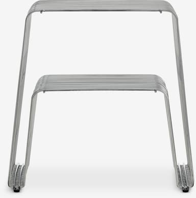 A modern chair constructed from bent metal rods. It features a minimalist design with parallel rods forming the seat and backrest, supported by a U-shaped frame. The legs also consist of bent metal rods, with a coiled design at the base. — 3D model