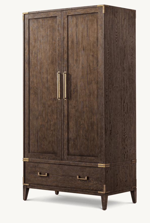 A tall, rectangular wardrobe or armoire constructed from dark-stained wood, featuring two upper cabinet doors and a single large drawer below. It incorporates distinctive brass corner brackets and strap hardware, indicative of campaign-style furniture. The wood exhibits a pronounced grain texture, and the unit stands on four short, tapered legs. — 3D model
