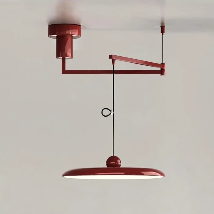A minimalist, adjustable ceiling-mounted pendant light featuring a deep red finish. The light consists of a cylindrical ceiling rose from which an articulated arm extends. A thin cord suspends a flat, disc-shaped diffuser, allowing for height adjustment via a small loop mechanism on the cord. The design is sleek and contemporary. — 3D model