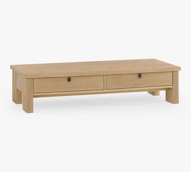 A rectangular coffee table with a light wood finish and two drawers. The table features a simple, modern design with sturdy legs and dark square drawer pulls. — 3D model