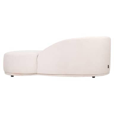 A modern chaise lounge with a curved backrest and a rolled armrest on the left side. It features a rounded form and is upholstered in a textured fabric. A small, cylindrical bolster pillow is positioned on the left side of the chaise. — 3D model