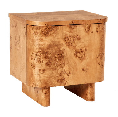 A compact, curved nightstand constructed from wood burl veneer. The top surface has a rounded edge and is composed of smaller rectangular panels. The front features a single door with a subtle seam indicating its opening mechanism. The piece rests on a pedestal base, also clad in wood burl veneer, which has a stepped design. — 3D model