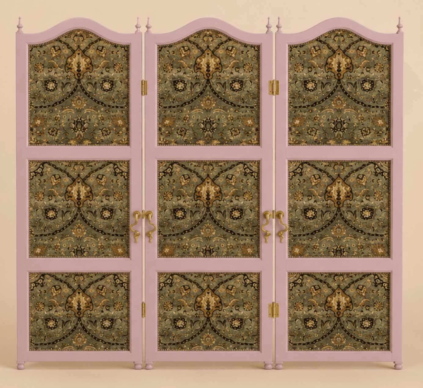 A three-panel folding room divider featuring a light pink wooden frame with ornate, intricately patterned textile panels. Each panel is hinged to allow for folding and positioning. The top edges of the panels have a scalloped design, and decorative finials are present at the top and bottom of the vertical supports, enhancing its traditional aesthetic. The textile features a dense, multi-colored pattern primarily in shades of green, gold, and dark accents. — 3D model