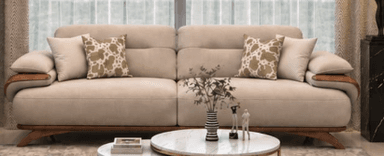 A contemporary upholstered sofa in a neutral beige fabric, featuring distinctive integrated wooden armrests and a matching curved wooden base, accompanied by decorative throw pillows. — 3D model