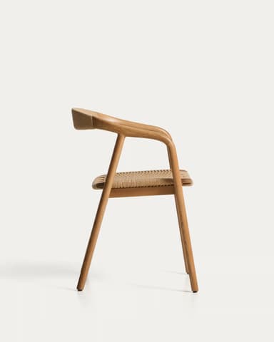 A modern dining chair with a curved backrest and a woven seat. The frame is constructed from light-colored wood, possibly oak, with a natural finish. The seat and backrest are made of a tightly woven natural fiber material, likely rattan or a similar cane, giving it a textured appearance. The chair has four legs, with the front legs being straight and the back legs appearing to extend upwards to form the chair's arms and support the backrest. The design is minimalist and ergonomic, emphasizing natural materials and clean lines. — 3D model