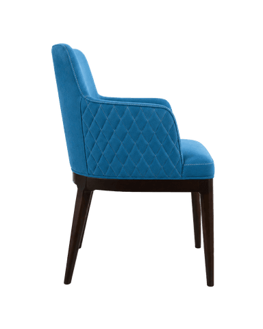 An upholstered armchair with a vibrant blue velvet-like fabric, featuring diamond quilting on the outer backrest and armrests, supported by dark, tapered wooden legs. — 3D model