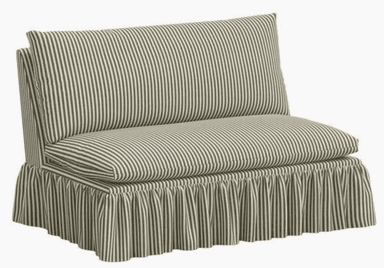 An armless chair upholstered in a striped fabric. The chair features a cushioned seat and a slightly reclined backrest. A prominent skirt with vertical pleats extends from the seat base to the floor, covering the legs. — 3D model