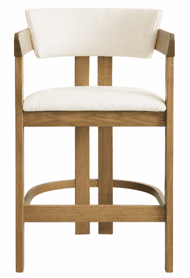 A contemporary bar stool featuring a light-colored wooden frame with integrated armrests and upholstered seat and backrest in a light-toned textured fabric. It has a sturdy four-legged base with a curved footrest. — 3D model