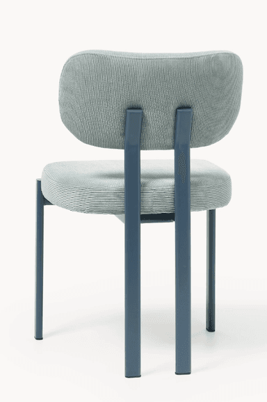 A modern chair with a slightly curved backrest and a separate seat cushion. The frame and legs are constructed from tubular metal. The upholstery is a light blue corduroy fabric. — 3D model