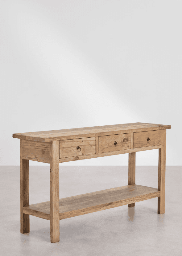 A long, narrow console table made of light-colored, distressed wood, featuring three drawers with black ring pulls and a full-length lower shelf. — 3D model