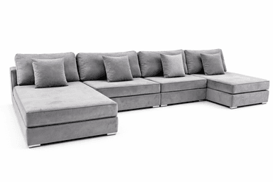 A modular, U-shaped sectional sofa upholstered in a soft, grey fabric. The sofa features deep seating, multiple seat cushions, and back cushions, along with four decorative throw pillows. It has a low profile with square arms and square metal legs. The design is contemporary. — 3D model