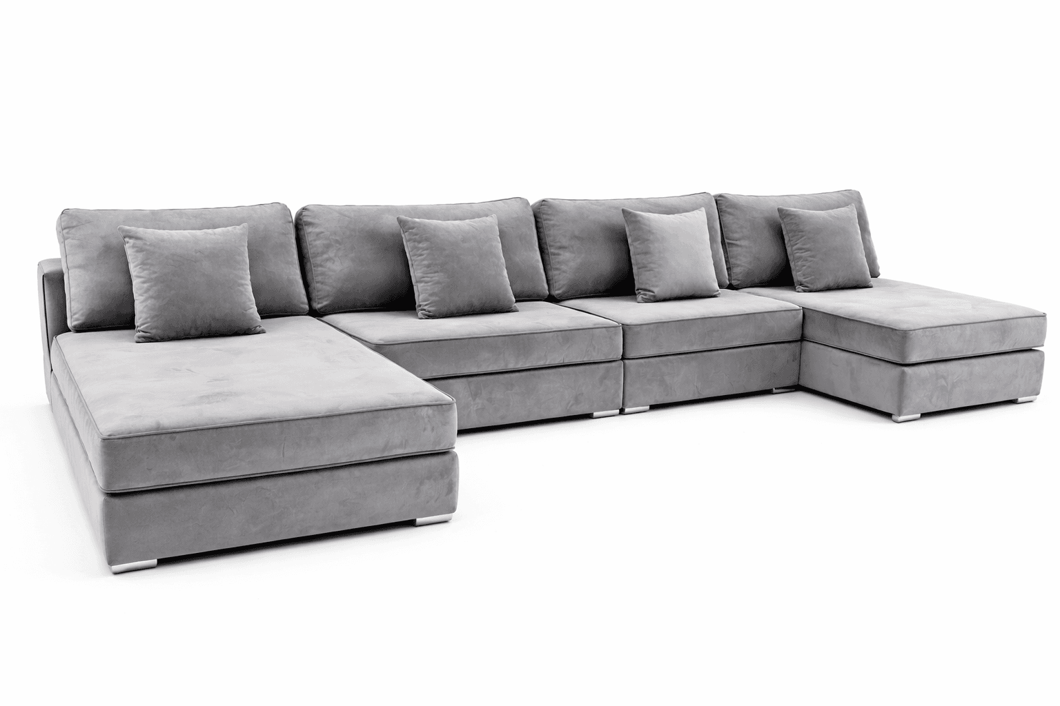 A modular, U-shaped sectional sofa upholstered in a soft, grey fabric. The sofa features deep seating, multiple seat cushions, and back cushions, along with four decorative throw pillows. It has a low profile with square arms and square metal legs. The design is contemporary. — 3D model