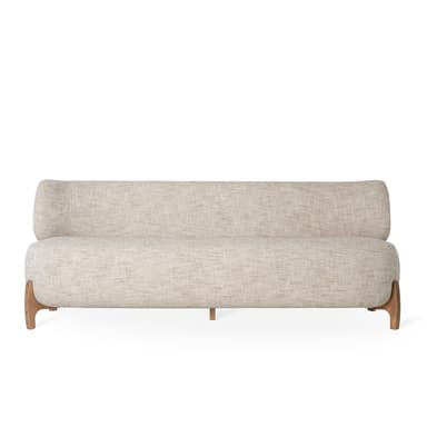 A modern sofa with a curved, organic form. It features a high, rounded back that extends to the sides, and a deep, cushioned seat. The sofa is upholstered in a light-colored, textured fabric and is supported by four simple wooden legs with a natural finish. The design emphasizes comfort and a contemporary aesthetic. — 3D model