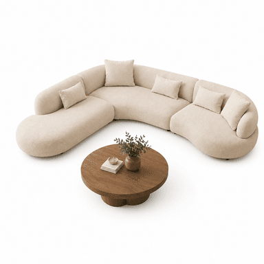 A large, light beige curvilinear modular sectional sofa upholstered in a textured bouclé fabric. The sofa consists of multiple smoothly curved sections that connect to form a wide, flowing seating arrangement, reminiscent of an organic or bean-like shape. It features a low-profile base and comes with several matching rectangular toss pillows. The design is contemporary with soft, rounded edges, prioritizing comfort and a sculptural aesthetic. — 3D model