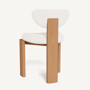 A modern chair with a distinct design featuring a wooden frame and a cushioned seat and backrest. The frame has a blocky, geometric construction with thick, upright legs and a similarly structured seat support. The backrest is curved and upholstered. The visible wood grain suggests a natural finish. — 3D model