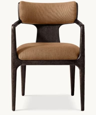 An upholstered dining armchair featuring a dark wood frame with integrated curved armrests and tapered legs. Both the seat and backrest are padded and covered in a warm orange-brown textured fabric. — 3D model