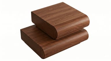 A modern, dark wood, rectangular table composed of two stacked elements. The larger base element is a low, elongated rectangular form with smoothly rounded vertical edges. A smaller, similar rectangular element is placed centrally on top of the larger one, also featuring rounded edges. The wood grain is prominent and runs horizontally across the surfaces. — 3D model