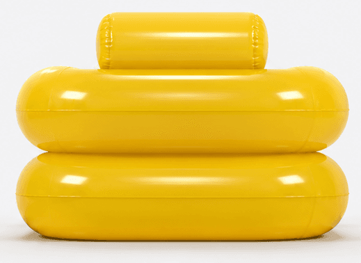 An abstract sofa design composed of three inflatable, cylindrical modules stacked and arranged to form a seating unit. The base consists of two large, horizontal cylindrical modules placed one above the other. A smaller, horizontal cylindrical module is placed on top of the upper base module, oriented parallel to the other two. The overall form is minimalist and organic, with rounded edges and a smooth, seamless appearance. — 3D model
