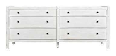 A low, horizontal dresser with two columns of drawers. The left column has three drawers, and the right column also has three drawers. All drawers have simple, dark, circular knobs. The dresser has a slightly curved apron at the bottom. — 3D model