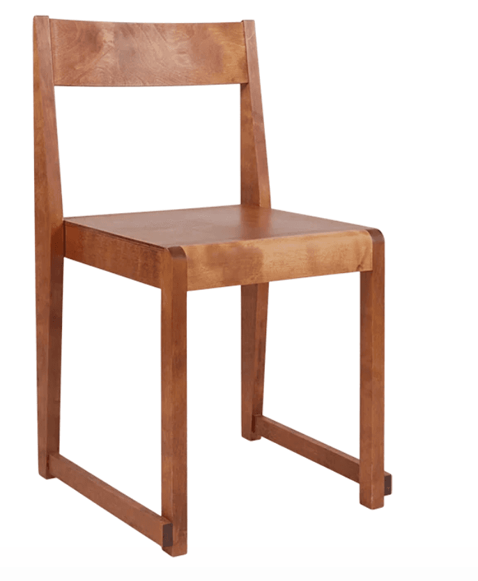 A minimalist armless dining chair constructed entirely from light-toned solid wood. It features a rectangular backrest, a flat seat, and four straight legs connected by lower stretchers. — 3D model