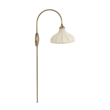 A modern wall sconce featuring a brass finish, an arched arm, a circular backplate, and a textured, ribbed fabric shade. A long, slender rod extends downwards from the backplate, which might be decorative or conceal wiring. — 3D model