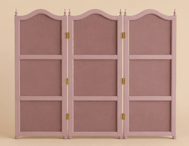 A three-panel folding room divider featuring a light pink wooden frame with ornate, intricately patterned textile panels. Each panel is hinged to allow for folding and positioning. The top edges of the panels have a scalloped design, and decorative finials are present at the top and bottom of the vertical supports, enhancing its traditional aesthetic. The textile features a dense, multi-colored pattern primarily in shades of green, gold, and dark accents. — 3D model